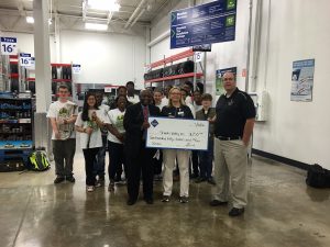 Sam's Wholesale makes a donation to the Shades Valley High Band